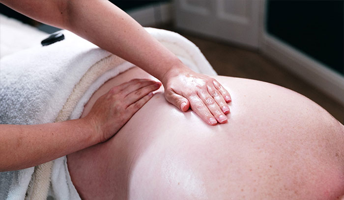 Woman having manual lymphatic drainage massage