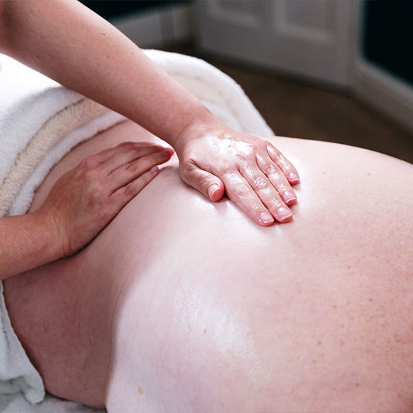 Lady with cancer receiving oncology massage